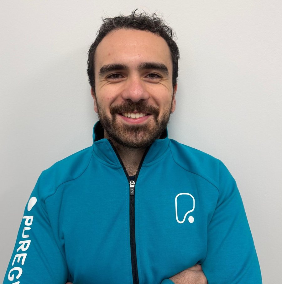 Samuel Farley, Level 3 personal trainer, in PureGym kit at PureGym London Stratford